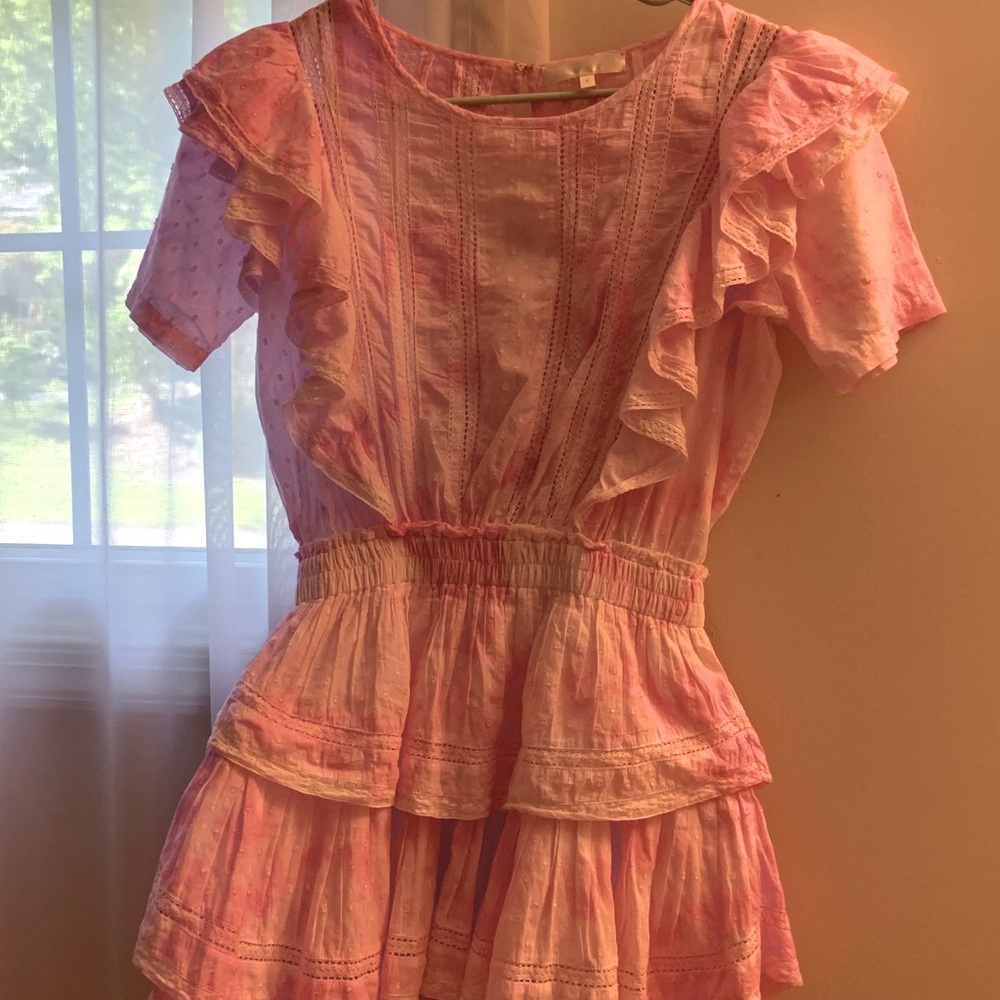 Pink LoveShackFancy mini dress.